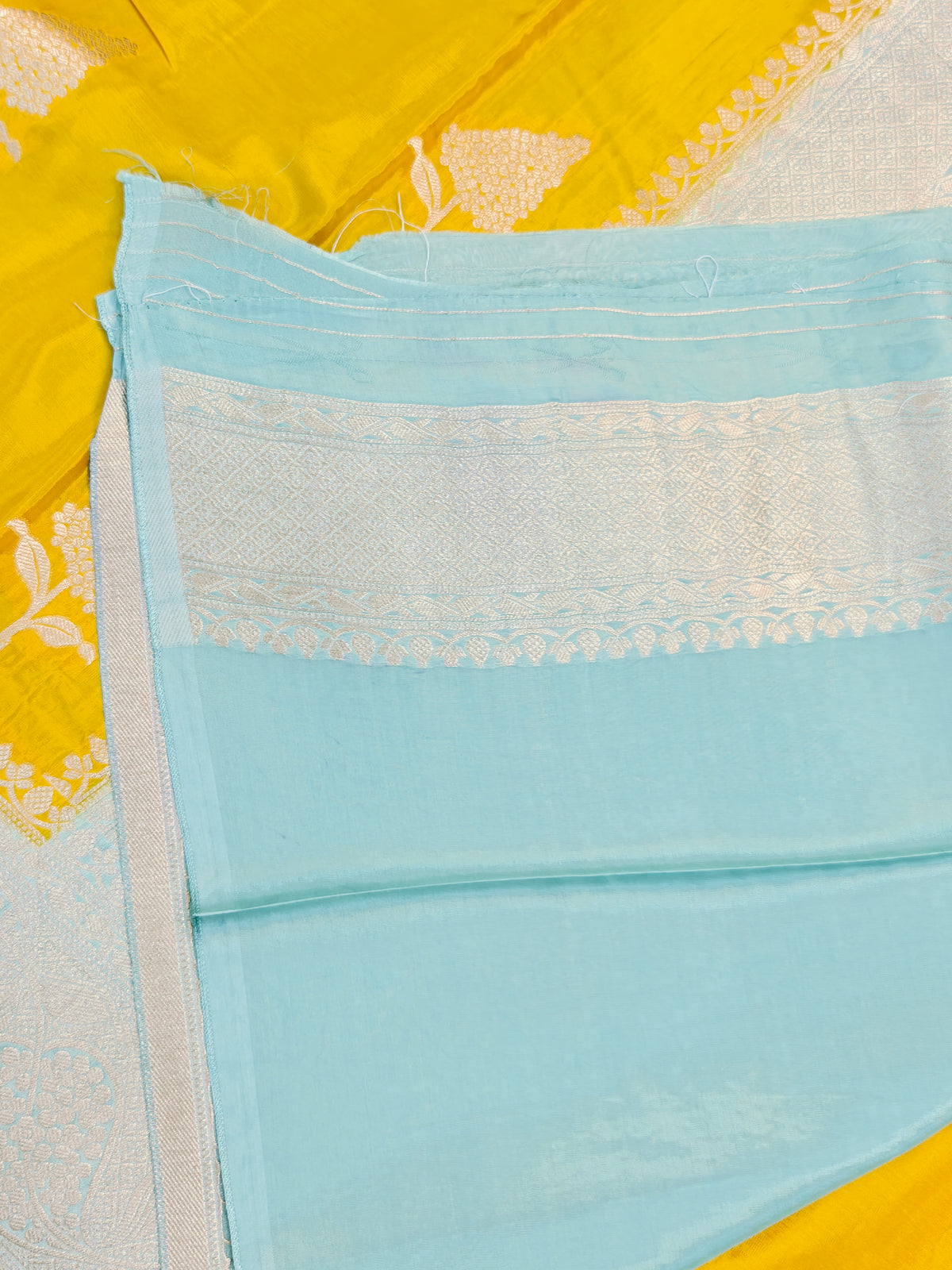 KOREAN SILK YELLOW WITH SKY BLUE AND GOLDEN ZARI BORDER