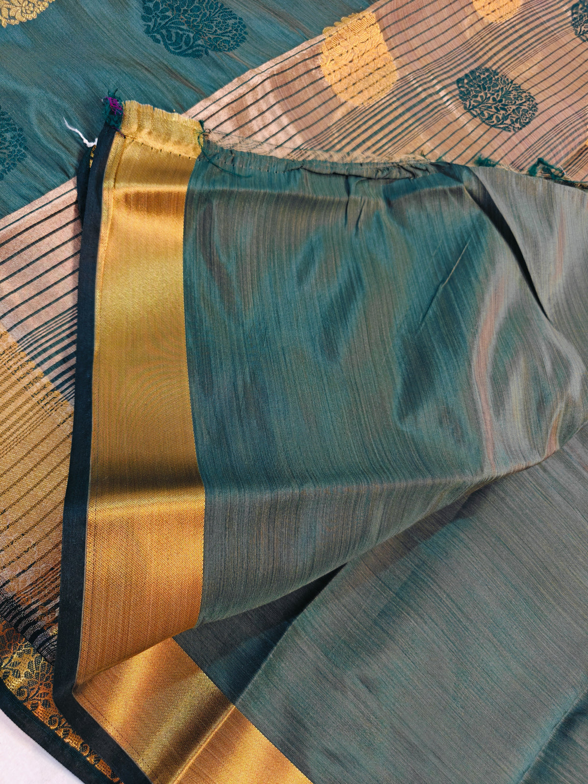 DOLA SILK PEACOCK TEAL BLUE WITH GOLDEN ZARI BORDER
