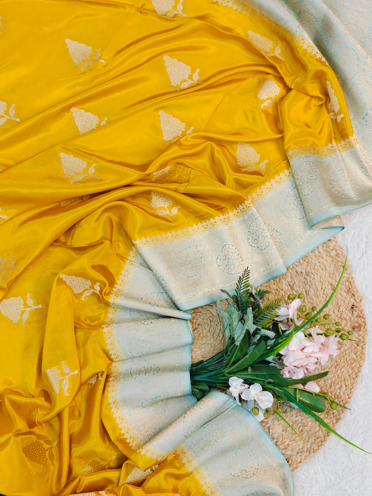 KOREAN SILK YELLOW WITH SKY BLUE AND GOLDEN ZARI BORDER