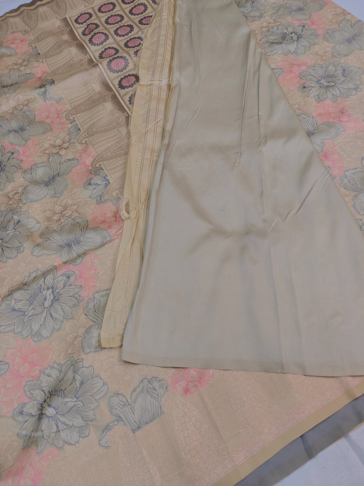 BANARASI SILK IN CREAM COLOUR WITH POSITION PRINT DESIGNING